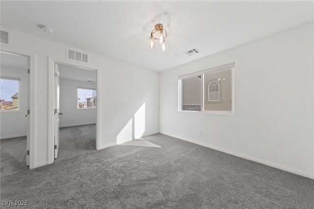 595 Beverly Pine Pl, Henderson, NV 89011 - carpeted empty room with visible vents and baseboards
