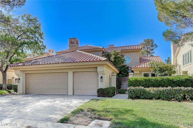 mediterranean / spanish-style home featuring a tiled roof, a chimney, driveway, and stucco siding
