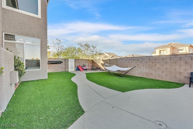 3738 Falcon Springs Dr, Las Vegas, NV 89147 - view of yard featuring a fenced backyard and a patio area