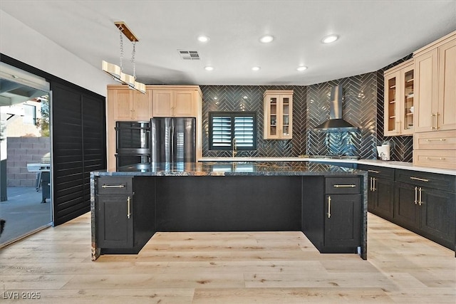 3738 Falcon Springs Dr, Las Vegas, NV 89147 - kitchen featuring visible vents, wall chimney exhaust hood, black appliances, and glass insert cabinets