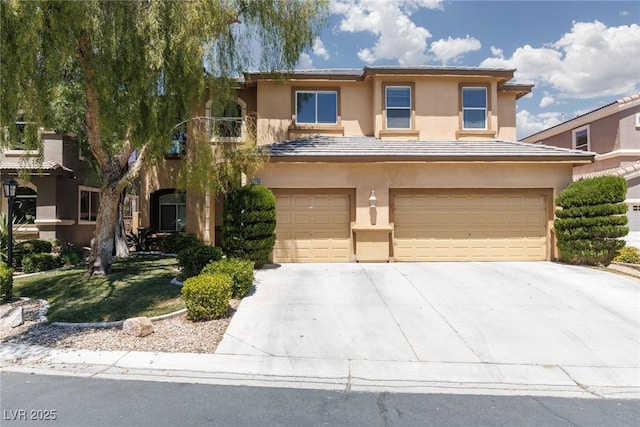7736 Villa Andrade Ave, Las Vegas, NV 89131 - view of front facade featuring a garage, stucco siding, and concrete driveway