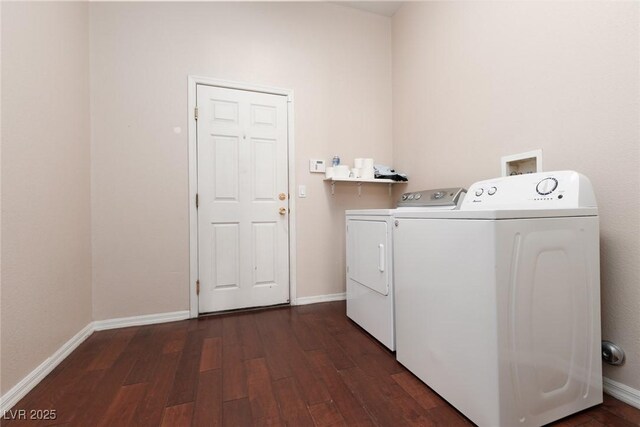 7736 Villa Andrade Ave, Las Vegas, NV 89131 - laundry room with washer and clothes dryer, dark wood-style floors, and baseboards