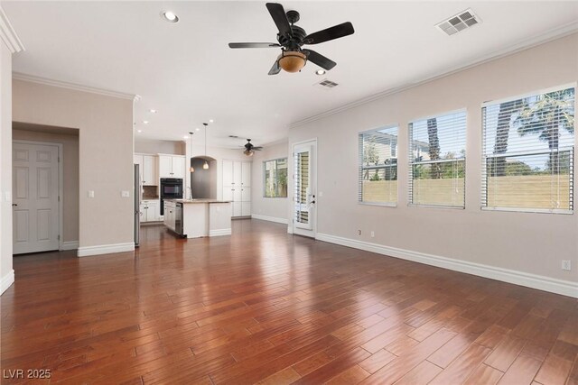 7736 Villa Andrade Ave, Las Vegas, NV 89131 - unfurnished living room with ceiling fan, baseboards, crown molding, dark wood-style flooring, and recessed lighting
