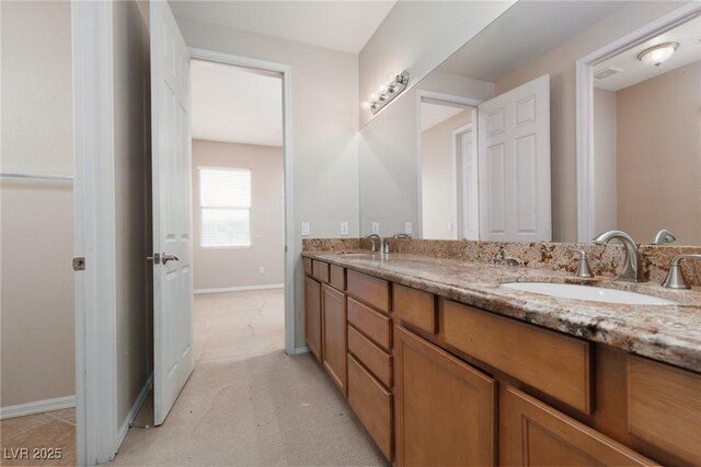 7736 Villa Andrade Ave, Las Vegas, NV 89131 - full bathroom featuring baseboards and double vanity