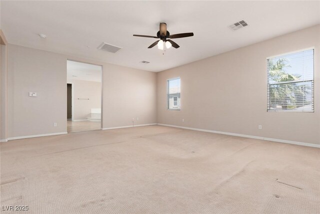 7736 Villa Andrade Ave, Las Vegas, NV 89131 - unfurnished room with light carpet, ceiling fan, and baseboards