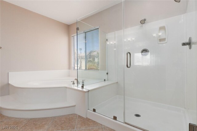 7736 Villa Andrade Ave, Las Vegas, NV 89131 - bathroom featuring a stall shower, tile patterned flooring, and a garden tub