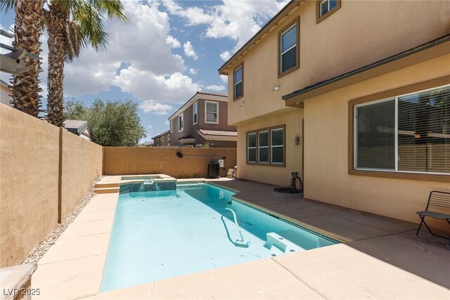 7736 Villa Andrade Ave, Las Vegas, NV 89131 - view of pool featuring a fenced backyard, a pool with connected hot tub, and a patio