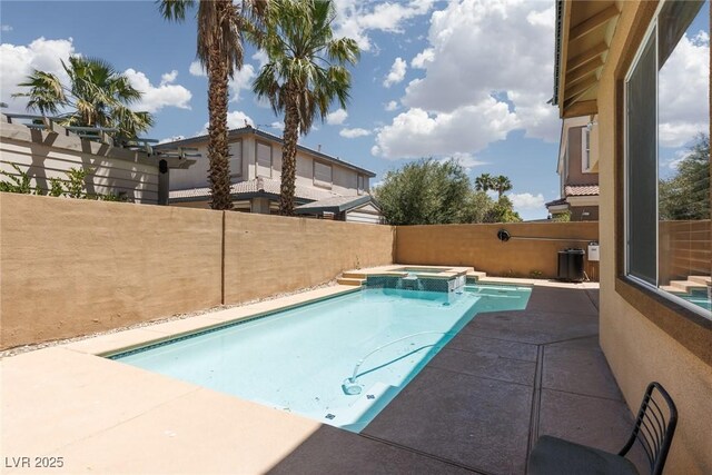 7736 Villa Andrade Ave, Las Vegas, NV 89131 - view of swimming pool with a patio, a fenced backyard, and a pool with connected hot tub