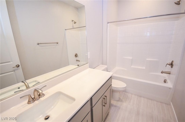 full bath featuring toilet,  shower combination, and vanity