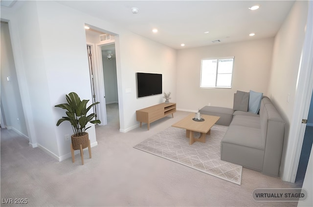 12101 Arrebol Ave, Las Vegas, NV 89138 - living room featuring light carpet and recessed lighting