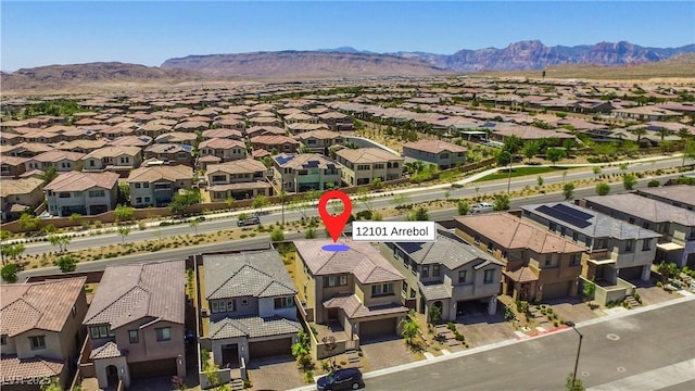 12101 Arrebol Ave, Las Vegas, NV 89138 - aerial perspective of suburban area featuring a mountain backdrop