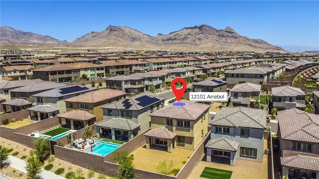 12101 Arrebol Ave, Las Vegas, NV 89138 - aerial view of residential area featuring a mountain backdrop and a pool