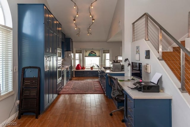 3008 Blue Fin Cir, Las Vegas, NV 89128 - office area with dark wood finished floors, lofted ceiling, and baseboards