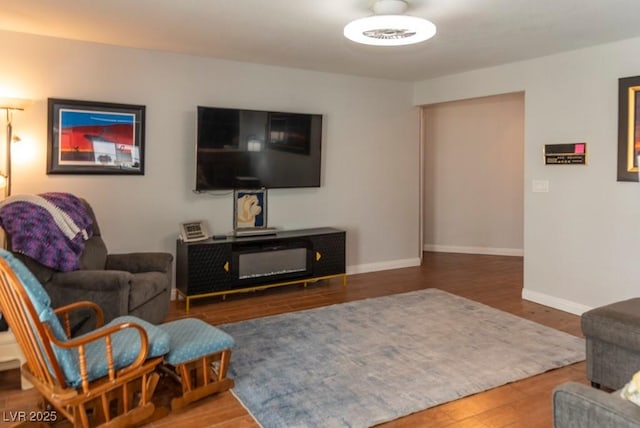 3008 Blue Fin Cir, Las Vegas, NV 89128 - living room featuring wood finished floors and baseboards