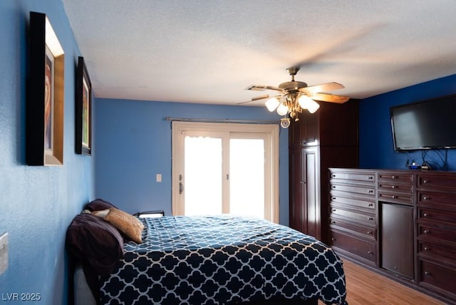 3008 Blue Fin Cir, Las Vegas, NV 89128 - bedroom featuring wood finished floors and ceiling fan