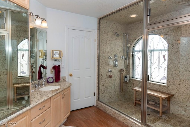 3008 Blue Fin Cir, Las Vegas, NV 89128 - full bath featuring tiled shower, wood finished floors, and vanity