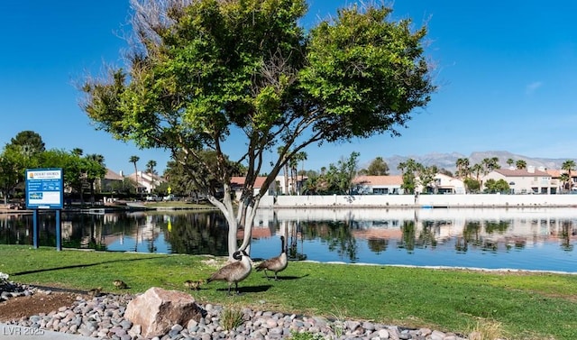 3008 Blue Fin Cir, Las Vegas, NV 89128 - water view with nearby suburban area and a mountain backdrop