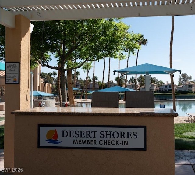 3008 Blue Fin Cir, Las Vegas, NV 89128 - view of patio with area for grilling and a water view