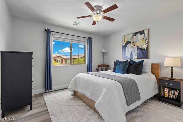 3268 Grayson Lake Ct, Las Vegas, NV 89129 - bedroom featuring baseboards, a ceiling fan, light wood-style flooring, and visible vents