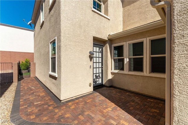view of patio featuring fence