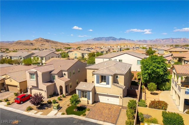 birds eye view of property featuring a residential view and a mountain view