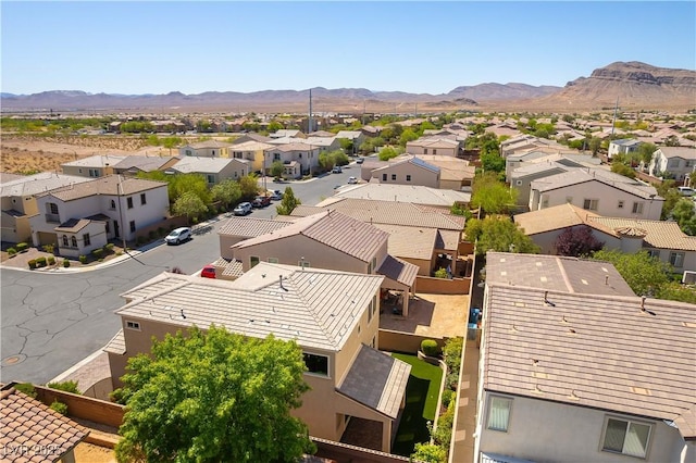 drone / aerial view with a residential view and a mountain view