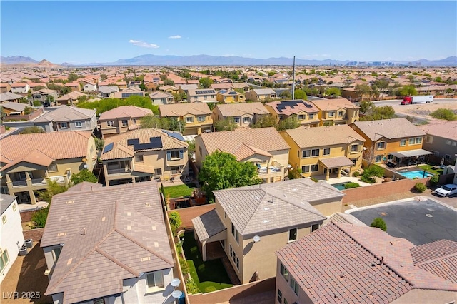 bird's eye view with a mountain view and a residential view