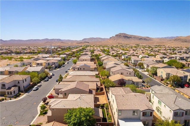 bird's eye view with a residential view and a mountain view