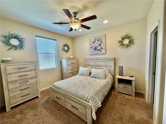 carpeted bedroom featuring a ceiling fan, baseboards, and recessed lighting