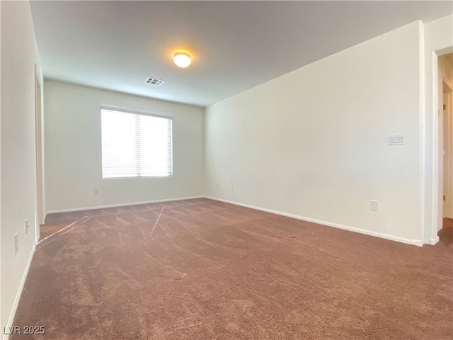 5513 Silent Springs Dr, Las Vegas, NV 89122 - empty room with carpet floors, baseboards, and visible vents