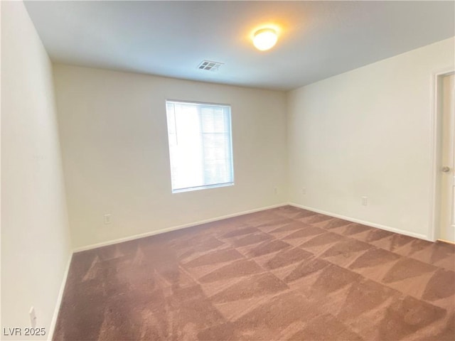 5513 Silent Springs Dr, Las Vegas, NV 89122 - carpeted spare room with visible vents and baseboards