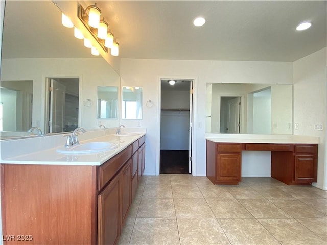 5513 Silent Springs Dr, Las Vegas, NV 89122 - full bathroom featuring double vanity, tile patterned floors, a spacious closet, and a sink
