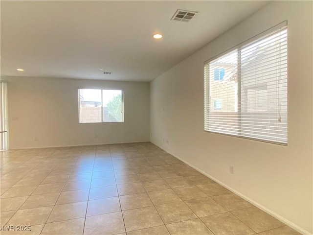 5513 Silent Springs Dr, Las Vegas, NV 89122 - spare room with light tile patterned floors, baseboards, recessed lighting, and visible vents