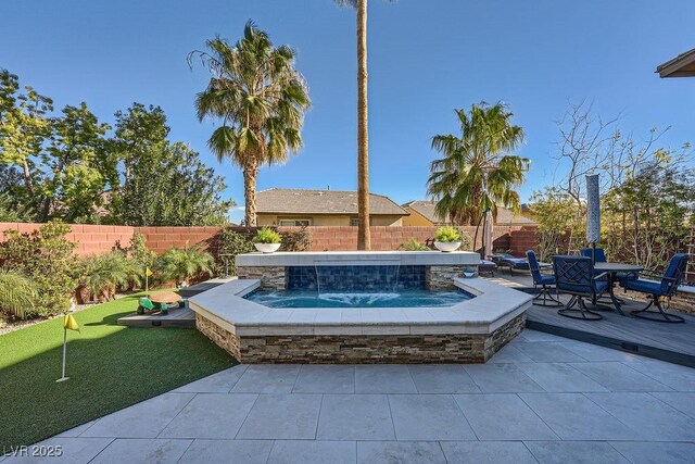 5442 Bristol Bend Ct, Las Vegas, NV 89135 - view of patio featuring a hot tub, a fenced backyard, and outdoor dining space