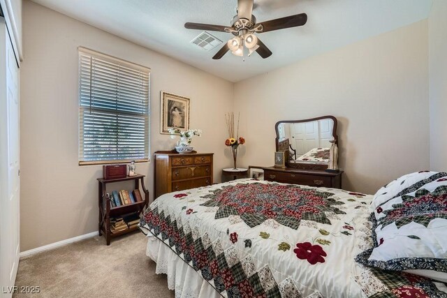 5442 Bristol Bend Ct, Las Vegas, NV 89135 - carpeted bedroom with baseboards, visible vents, and ceiling fan