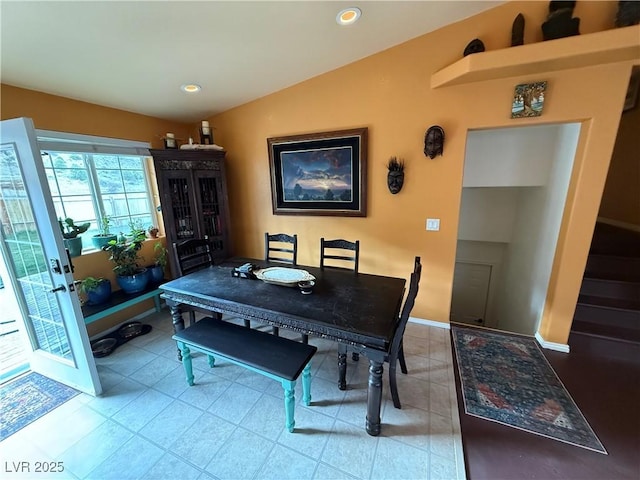 1409 Mill St, Ely, NV 89301 - tiled dining space with recessed lighting and lofted ceiling