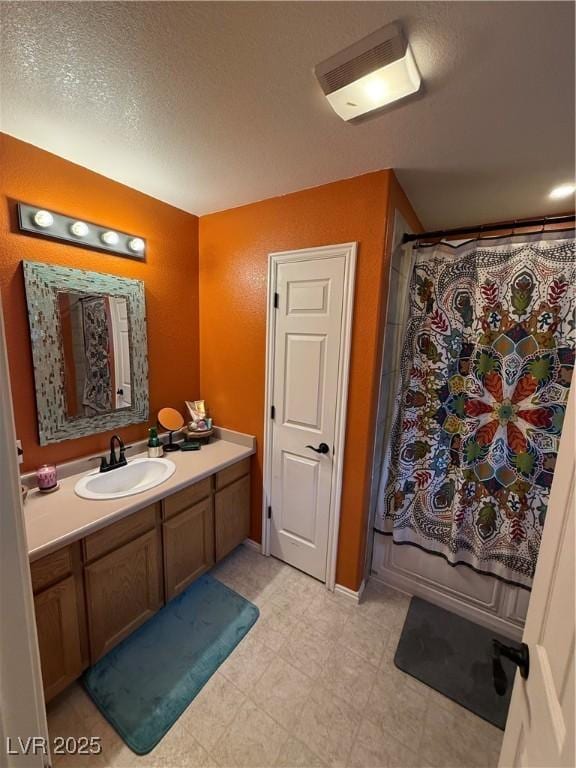 1409 Mill St, Ely, NV 89301 - bathroom featuring vanity, curtained shower, and visible vents