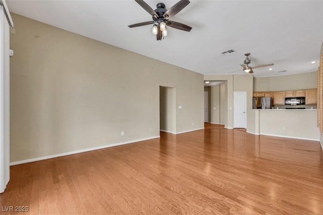 unfurnished living room featuring visible vents, baseboards, recessed lighting, a ceiling fan, and light wood-style flooring