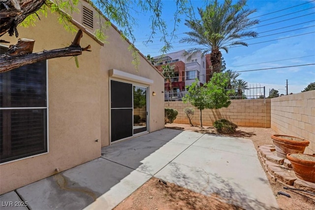 view of patio with fence