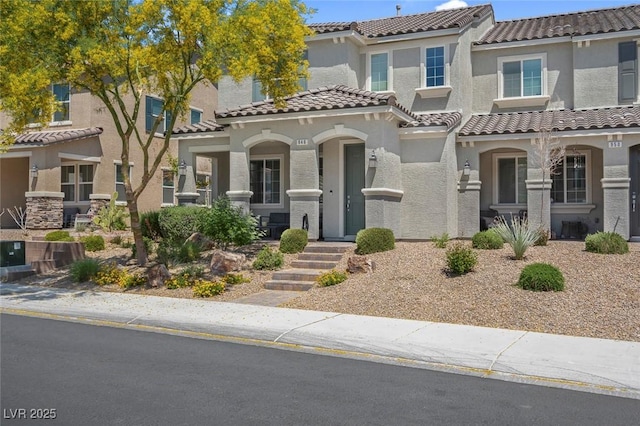 946 Belton Lake Ave, North Las Vegas, NV 89086 - view of front of house featuring stucco siding and a tile roof