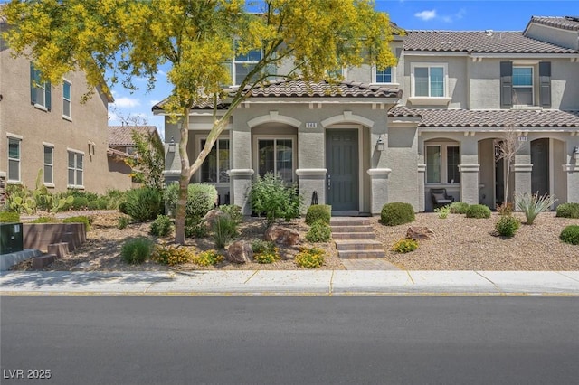 946 Belton Lake Ave, North Las Vegas, NV 89086 - mediterranean / spanish-style home featuring a tiled roof and stucco siding
