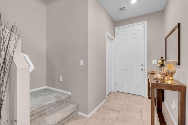 946 Belton Lake Ave, North Las Vegas, NV 89086 - foyer with light tile patterned floors, baseboards, recessed lighting, and visible vents