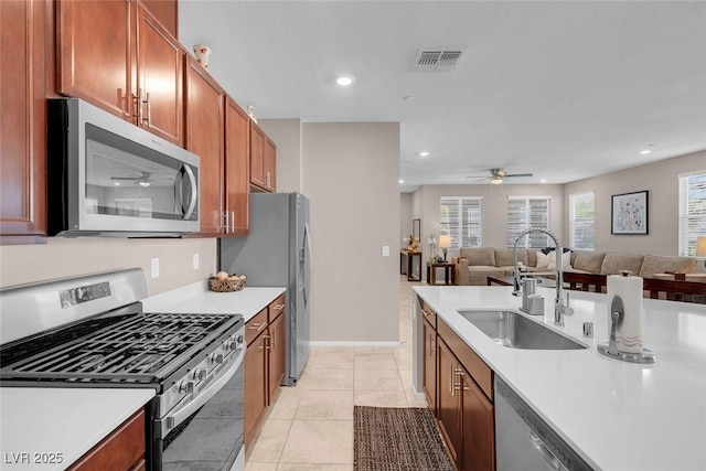 946 Belton Lake Ave, North Las Vegas, NV 89086 - kitchen with visible vents, a sink, appliances with stainless steel finishes, and ceiling fan
