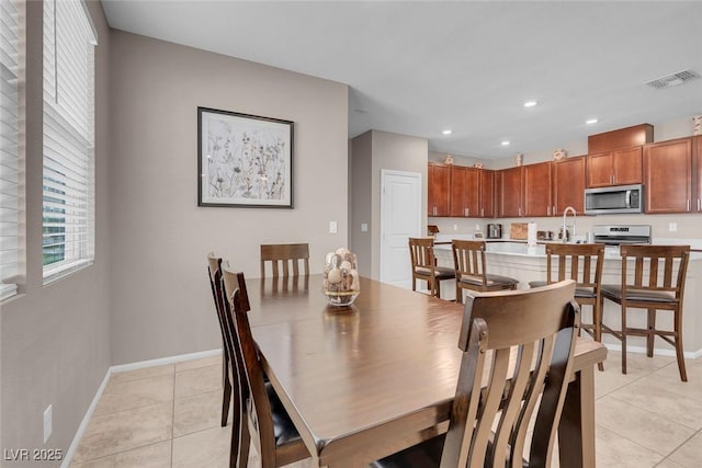 946 Belton Lake Ave, North Las Vegas, NV 89086 - dining area featuring visible vents, recessed lighting, baseboards, and light tile patterned floors