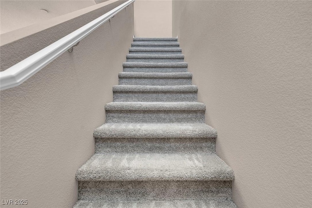 946 Belton Lake Ave, North Las Vegas, NV 89086 - staircase featuring a textured wall