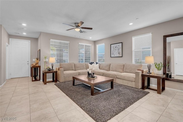 946 Belton Lake Ave, North Las Vegas, NV 89086 - living room featuring light tile patterned floors, ceiling fan, and recessed lighting