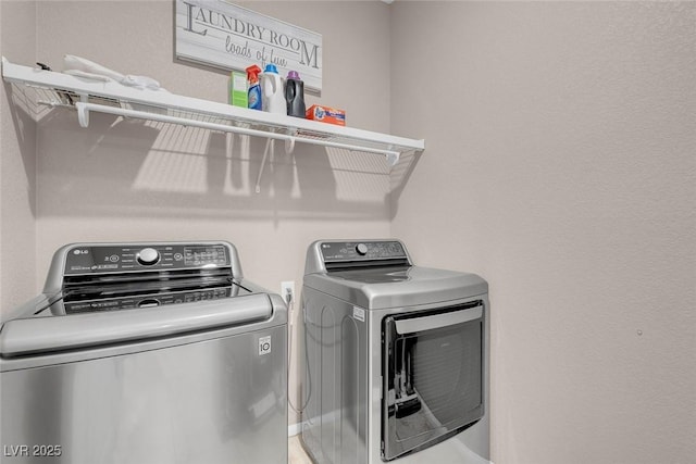 946 Belton Lake Ave, North Las Vegas, NV 89086 - clothes washing area with independent washer and dryer and laundry area