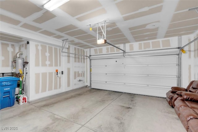 946 Belton Lake Ave, North Las Vegas, NV 89086 - garage with a garage door opener and gas water heater