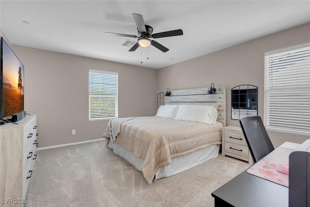 946 Belton Lake Ave, North Las Vegas, NV 89086 - bedroom featuring baseboards, light carpet, and ceiling fan