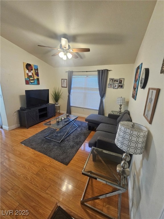 555 E Silverado Ranch Blvd Unit 2028, Las Vegas, NV 89183 - living room with wood finished floors, ceiling fan, vaulted ceiling, and baseboards